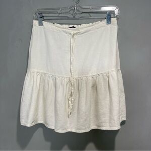 Brandy Melville linen blend white mini skirt.